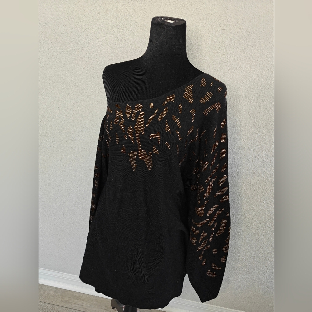 Elegant Black Sweater with Gold Accents